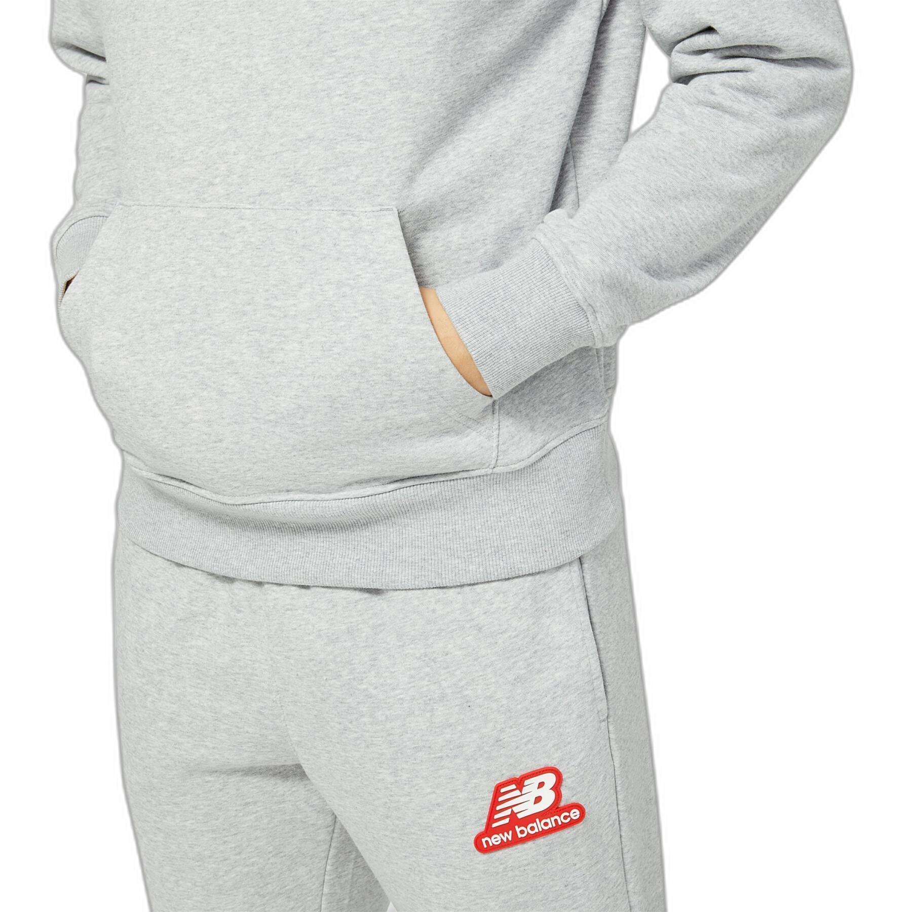 Sweatshirt à capuche graphique en caoutchouc molleton New Balance Essentials